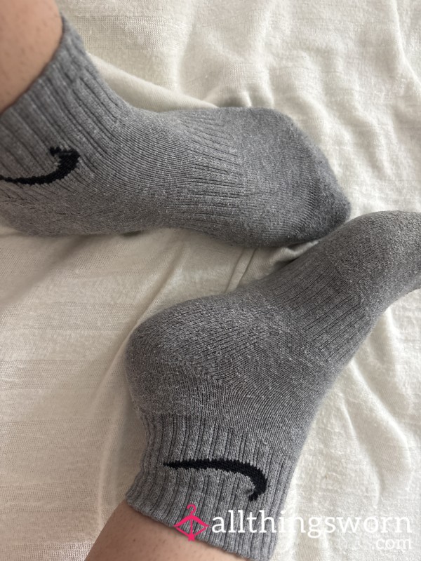 24 Year Old Bartenders Sweaty Grey Nike Socks.