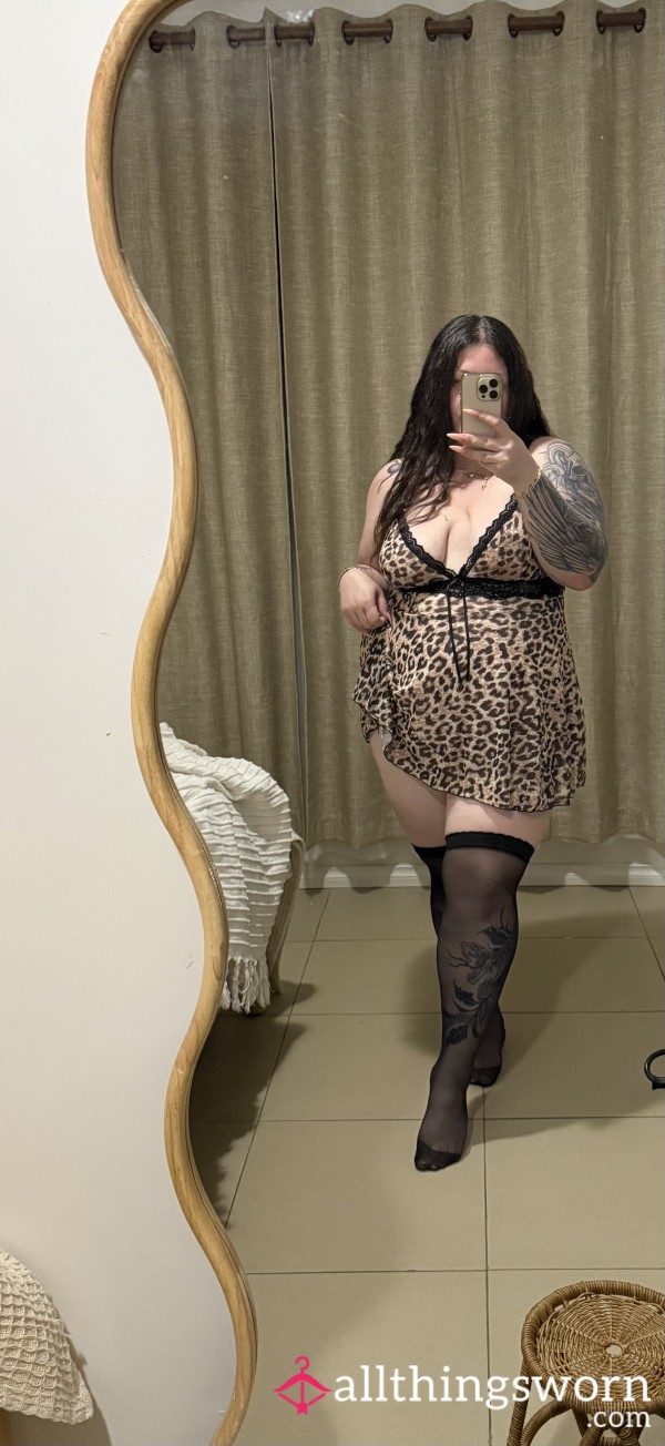 (3) Available. Worn Black Sheer Knee High Stockings.