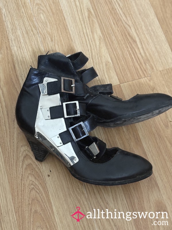 All You Need Is A Whip To Go With These Kinky Metal Buckled Worn Out Loads Ankle Boots.