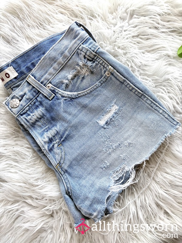 AMO Billie Short In A Light Wash With Heavy Distressing