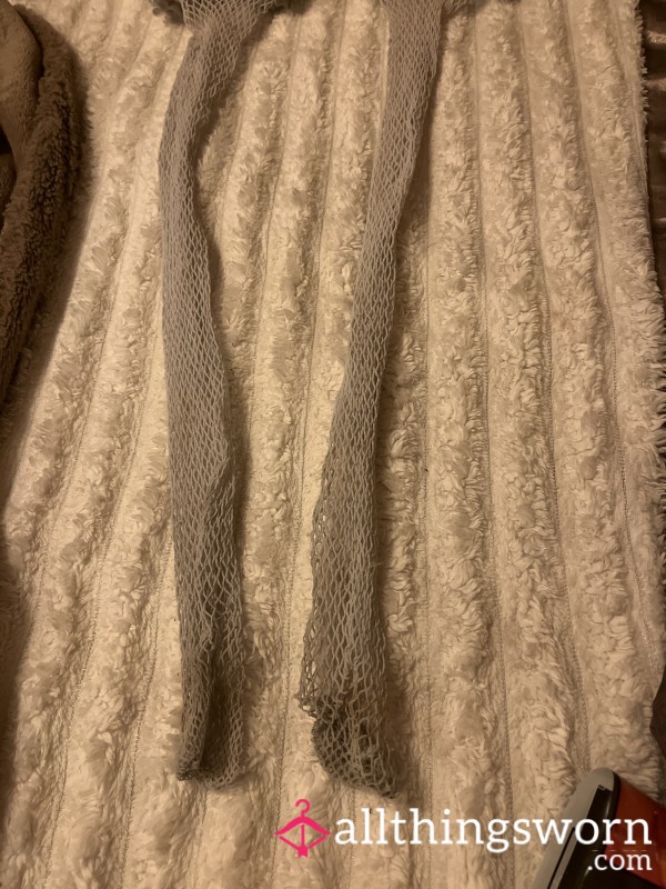 Fishnet Stockings. Well Worn And Well Loved Stockings.