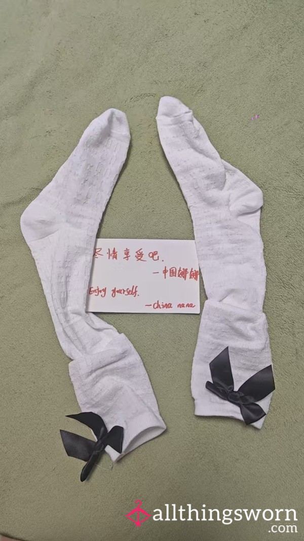 Asian Girl Wearing White Socks With Bow Tie