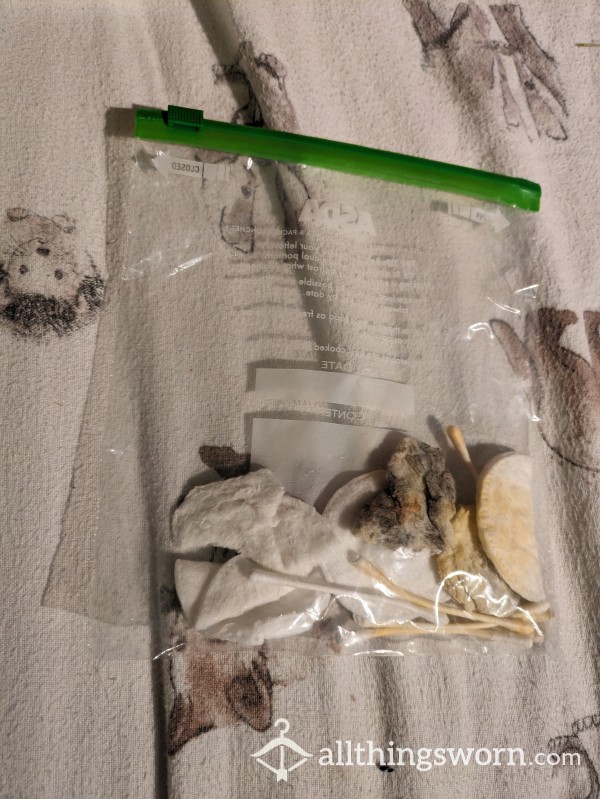Bag Of Used Makeup Pads And Cotton Buds