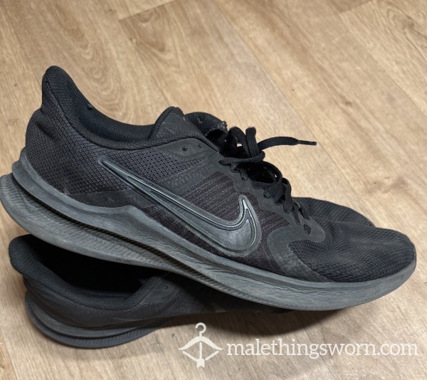 Battered Black Nike Trainers