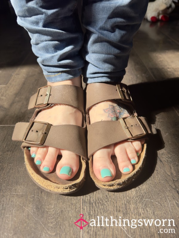 Birkenstocks And Feet With Teal Nails