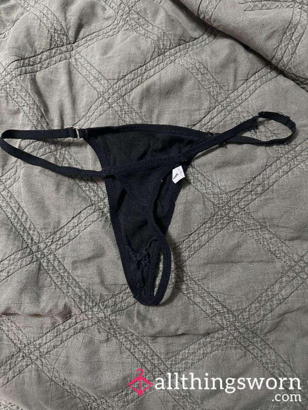 Black Gstring Slightly Frayed And Torn