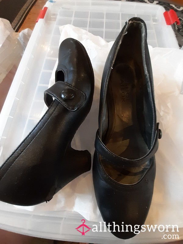 Black Heeled Cross Bar Shoes Well Worn