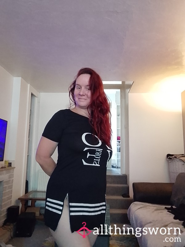 Black Nighty Or Dress With Zipped Splits Top Of Both Legs.