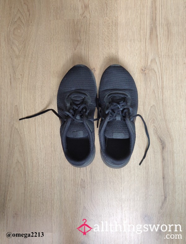 Black Nike Trainers Worn To Work As Security