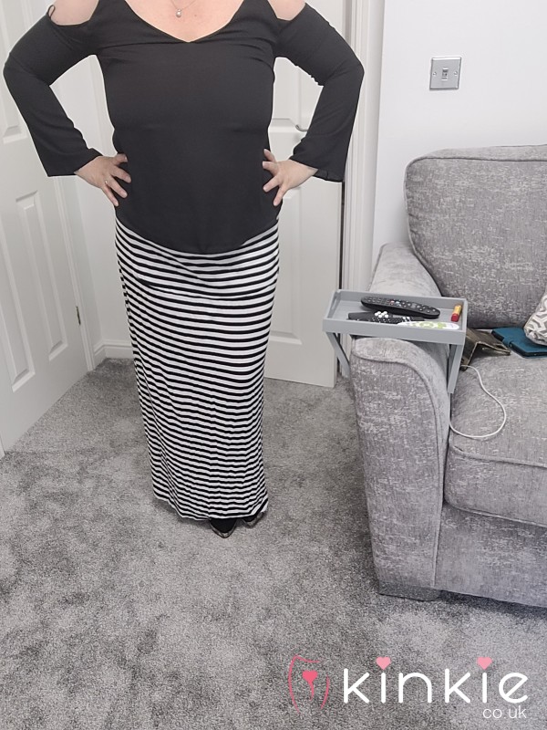 Black Top And Stripe Skirt
