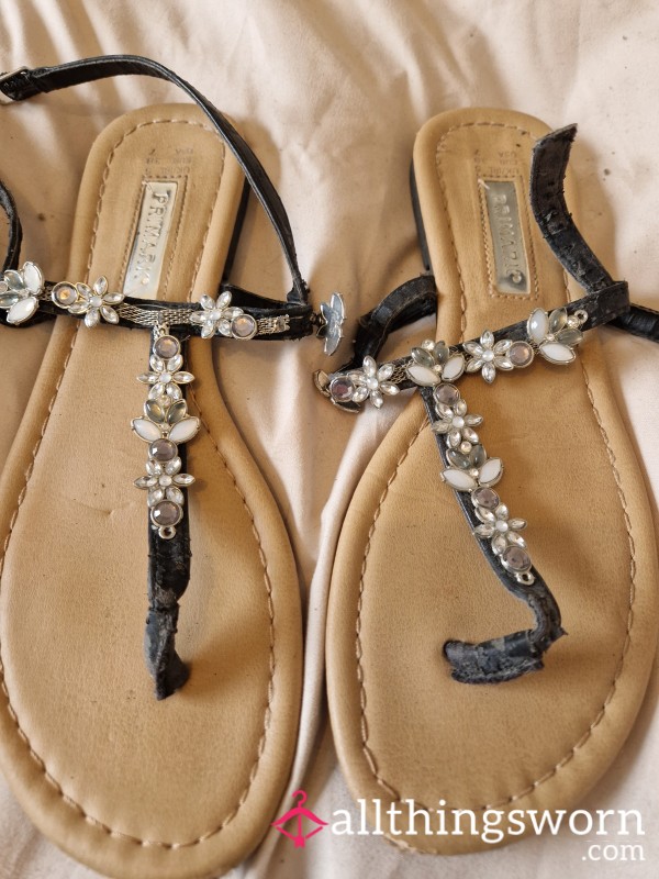 Black Worn Flip Flops