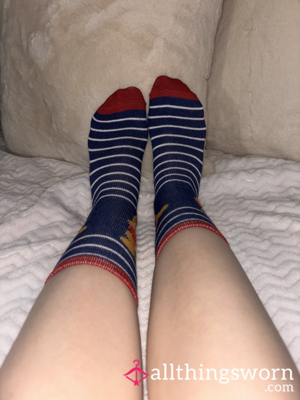 Blue And White Striped Socks With A Bear