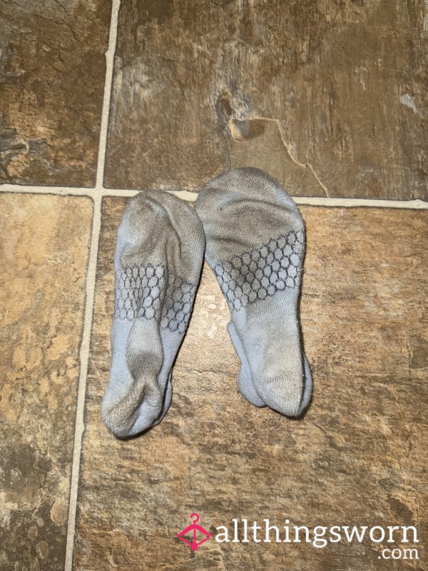 Blue Bombas On Tile — Well‑Worn Everyday No‑Shows