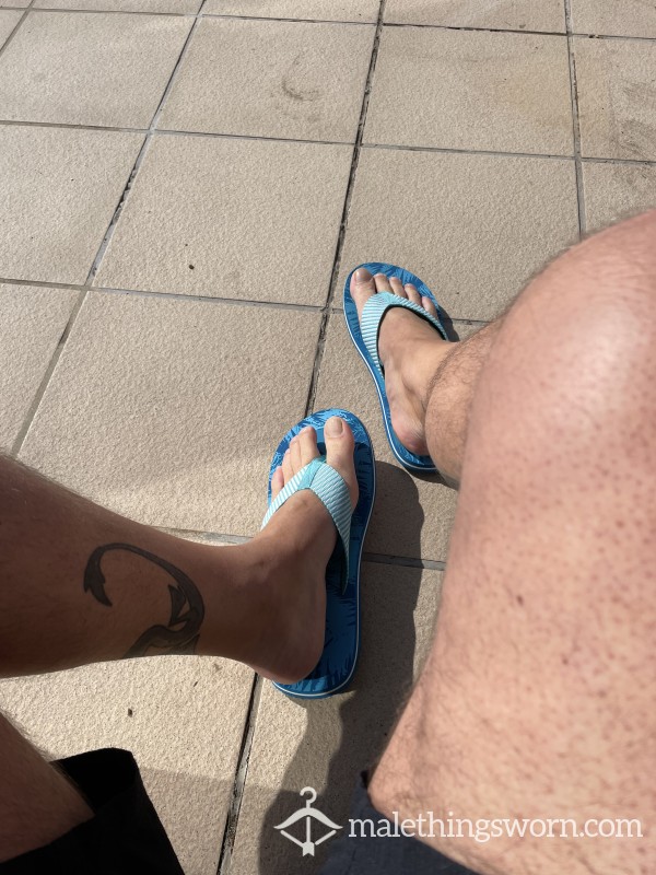 Blue Well Worn Flip Flops