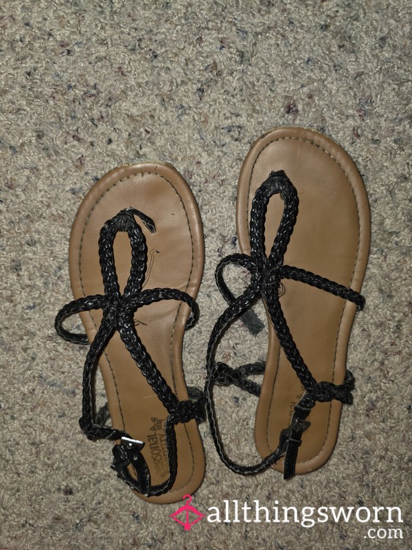 Broken And Well Worn Sandals