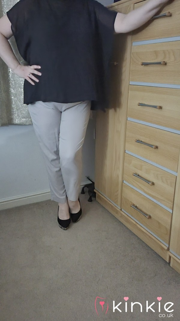 Cream Trousers And Black Top