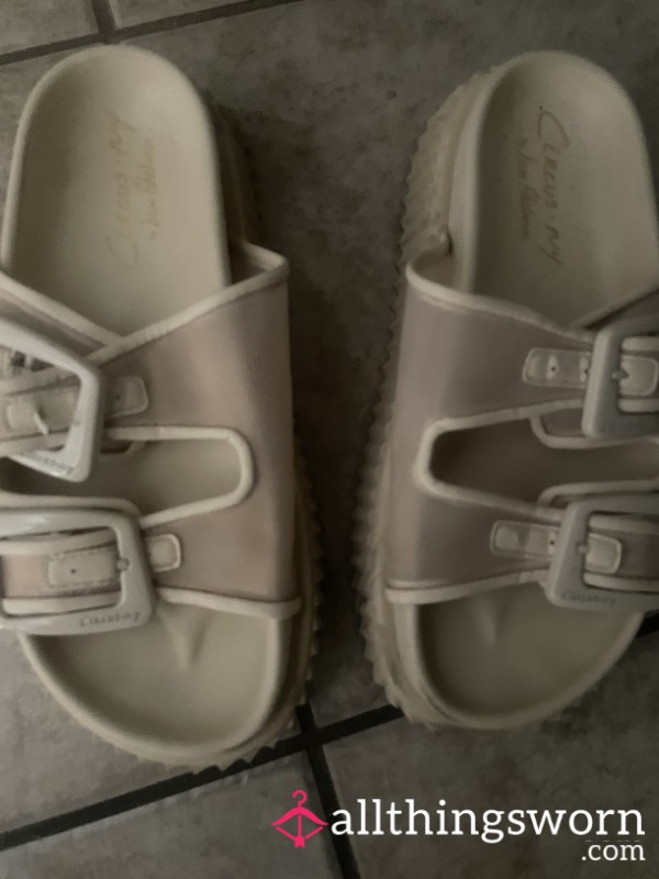 Creamy Well Worn Plastic Sandals