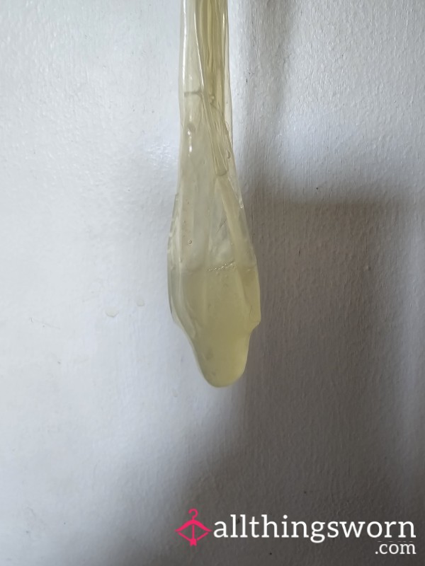 Cuck Condom Filled With Alpha C*m
