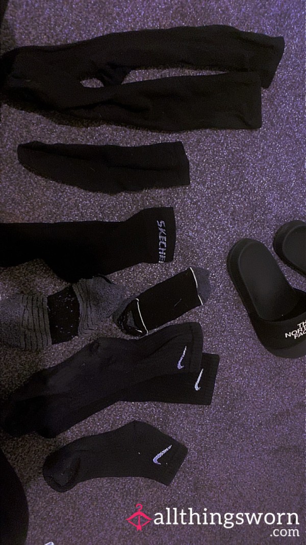 Different Style Black Dark Socks Well Worn