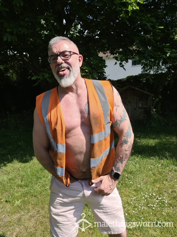 Dirty Hi-Vis Vest Worn In Warehouse Work