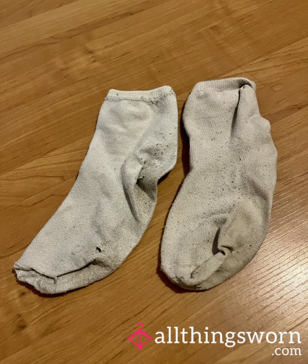 Dirty Socks With Holes