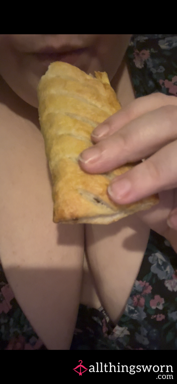Enjoying A Greggs Sausage Roll