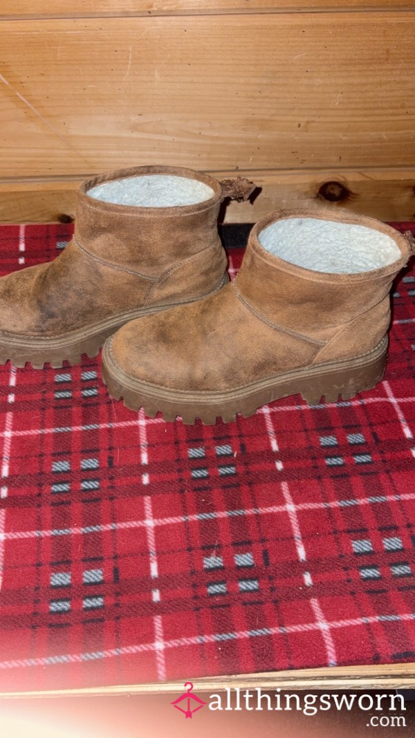 Extremely Well Worn Ugg Boots.