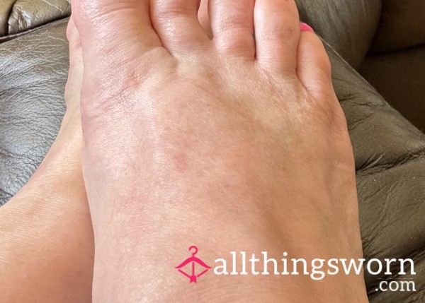 Feet And Pink Toes