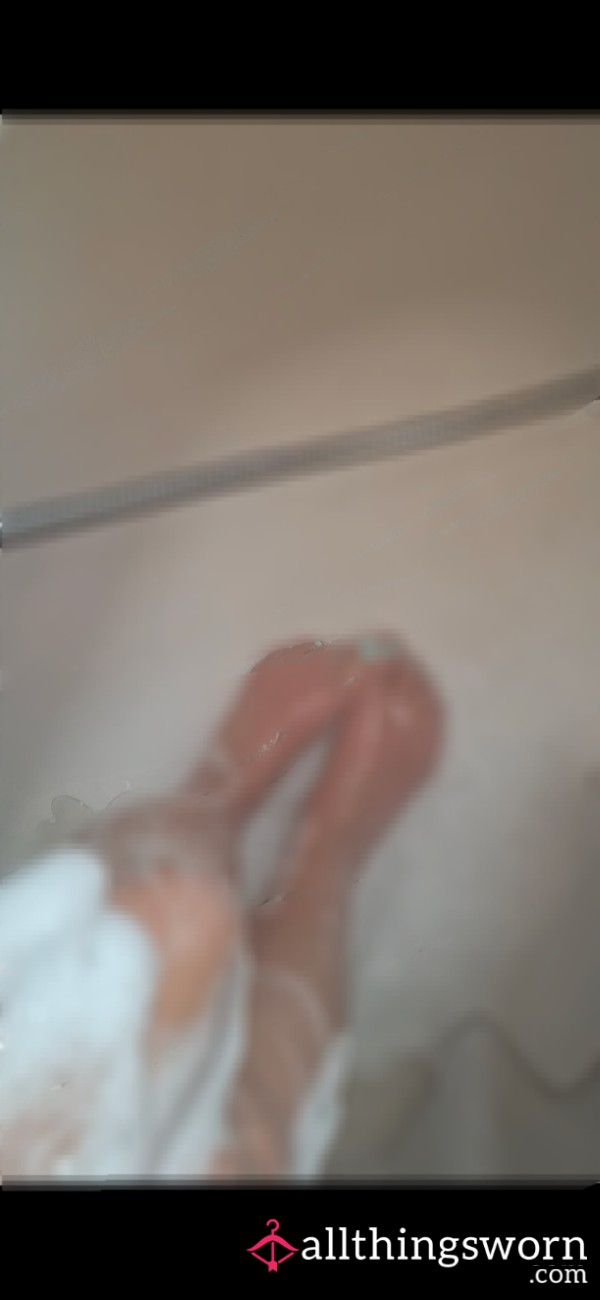 Feet Being Washed In The Shower