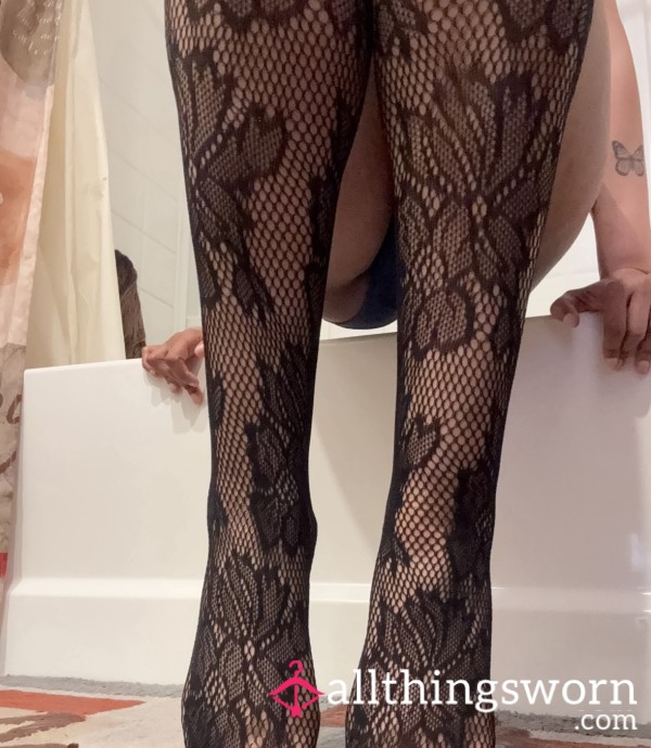 Feet In Black Knee-high Stockings