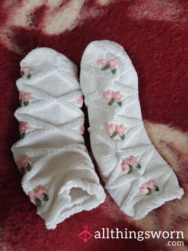 Feet In Frilly White Socks