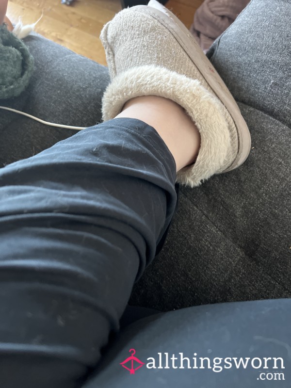 Feet In Slippers And Without