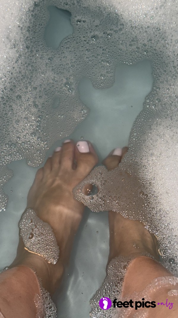 Feet Play Time In Bath Water After A Hard Days Gym Sessions And Walking