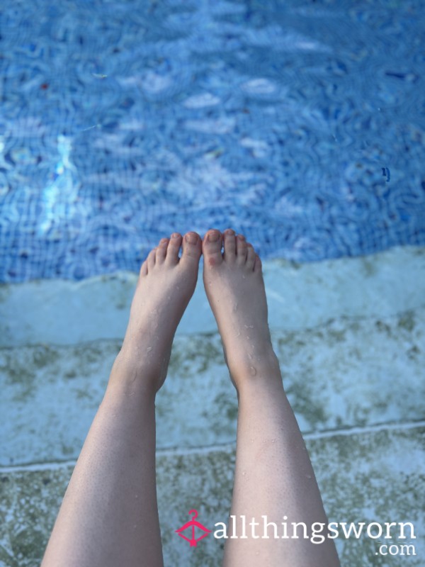 Feet Splashing In The P**l.