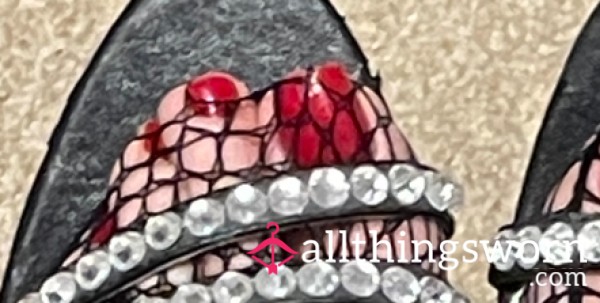 Fishnets, Studs And Painted Toes