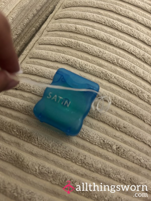 Freshly Used Dental Floss With Some Food & Sp*t