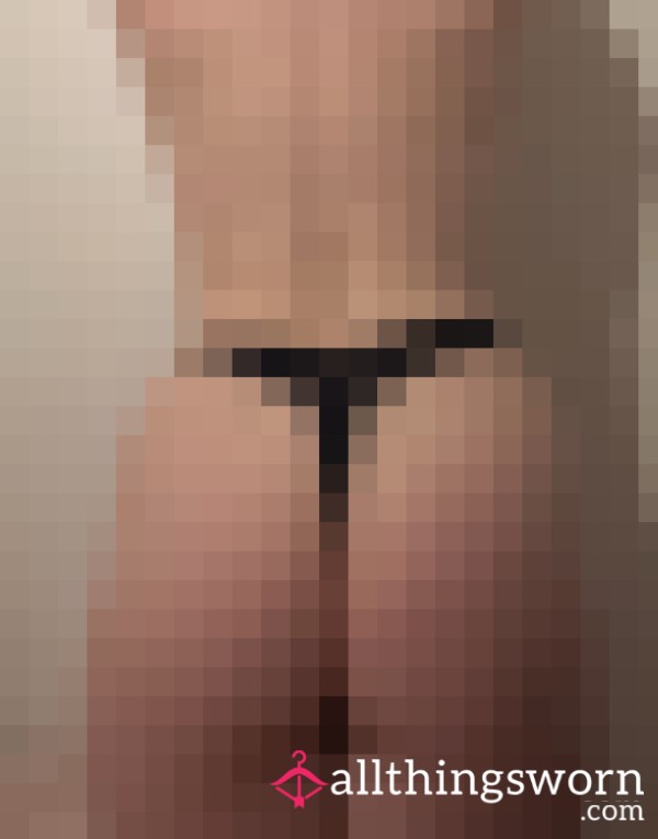 Goddess Emily In A Thong Against A Wall