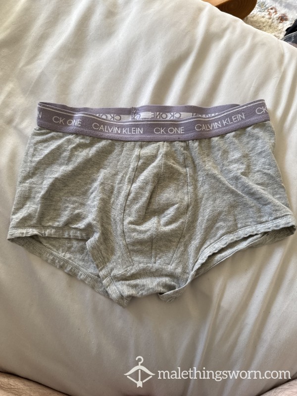 Grey And Purple Calvin Klein Boxes Ready To Make Dirty With Your Request
