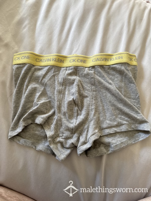 Grey Calvin Klein With The Yellow Band Ready To Make Dirty With Your Requests😈🥵