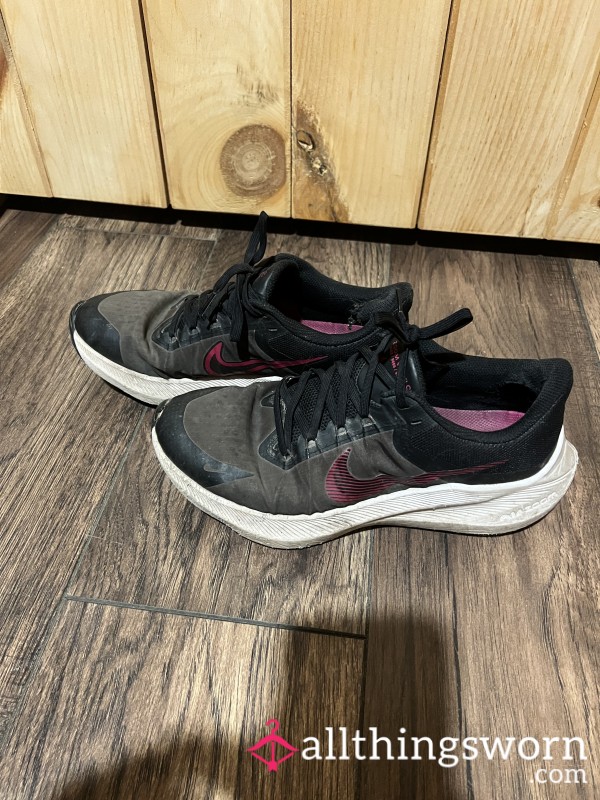 Heavily Worn Nike Sneakers
