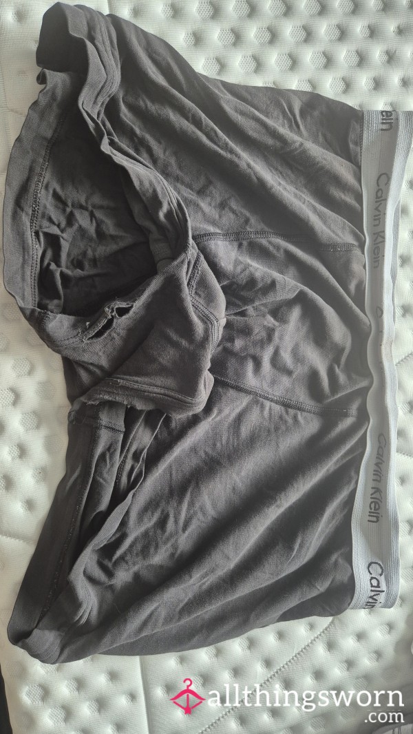 Husbands Worn Calvin Kleins