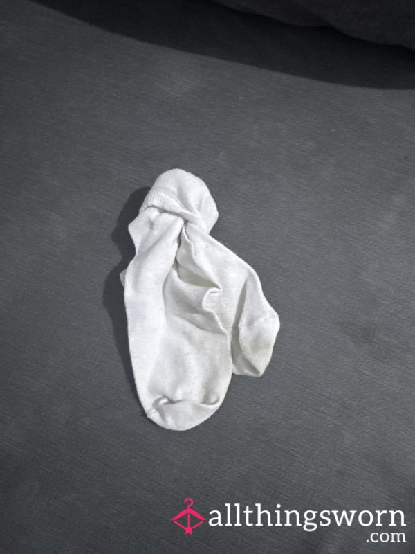Indulge In The Raw Essence Of Desire With This Worn Sock, Straight From The Foot Of Your Goddess. Every Thread Is Soaked In My Scent, Every Curve Holds The Heat Of My Stride. It’s Not Just A