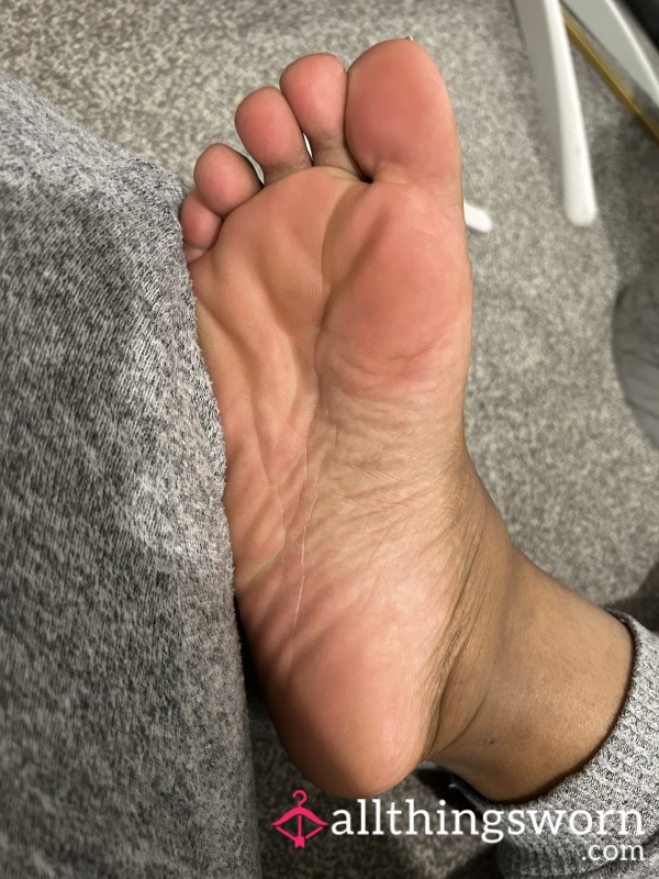 Lotion Rubbed Into Feet After Shower