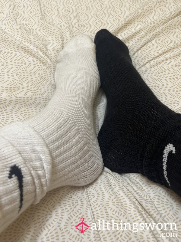 Mismatched Nike Socks - One Black One White