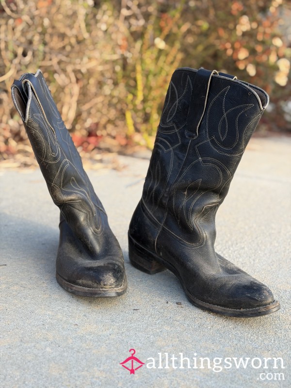 Bare Feet On Well Worn Boots