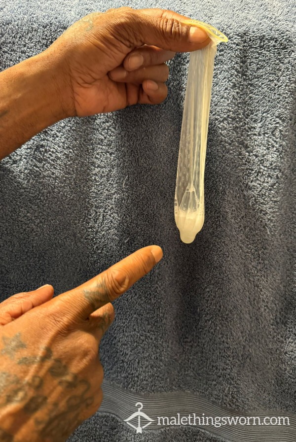 MY C*m IN A CONDOM.