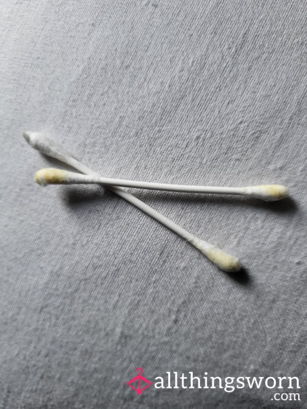 Earbuds And Cotton Pads