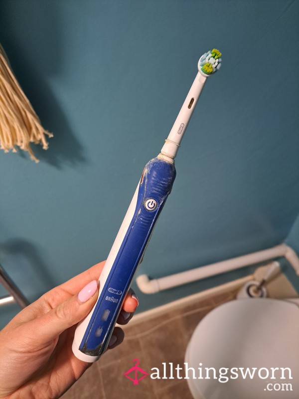 Old And Very Used Electric Toothbrush