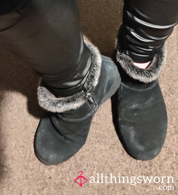 Old And Worn Black Boots