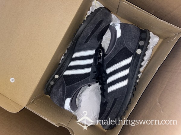 Old Used Blue Adidas Trainers